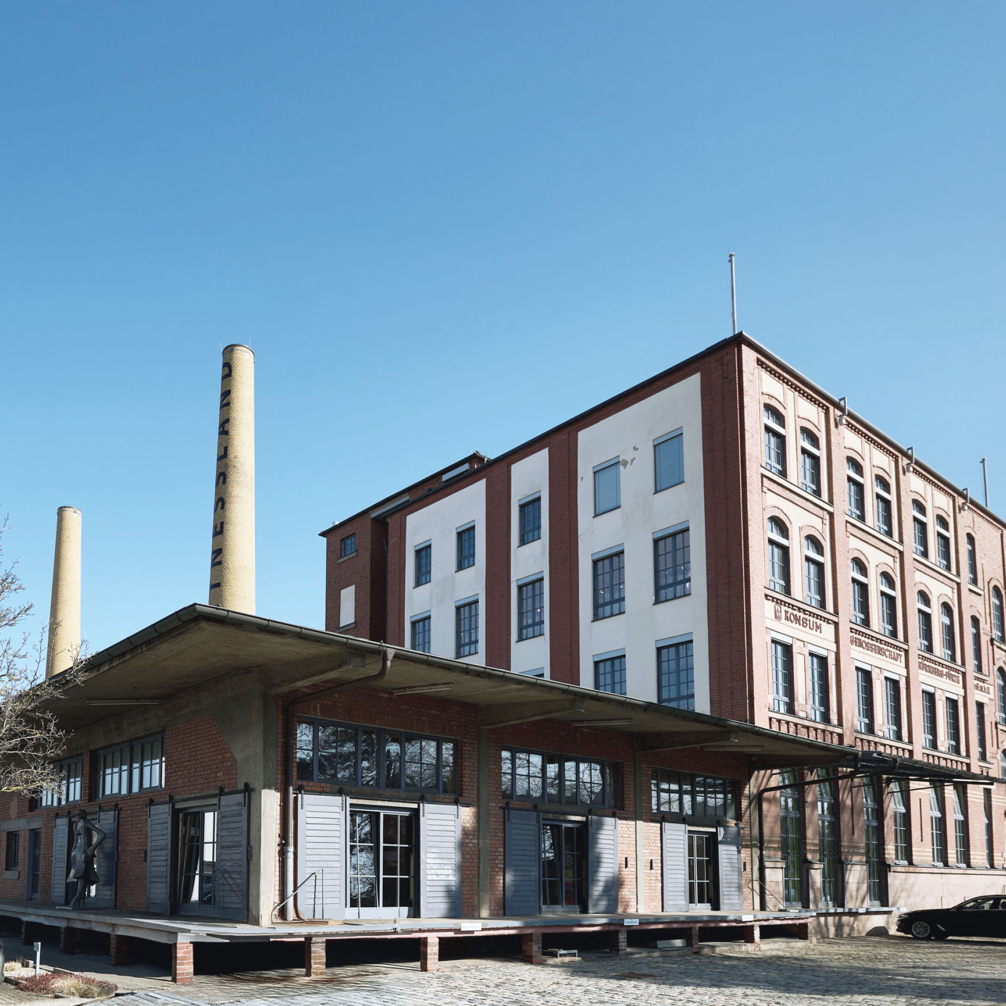 Historisch-moderner Campus mit Backsteinhaus der ehemaligen Dampfbäckerei